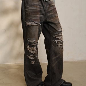 Distressed Black Vintage Jeans with Inner Seam Wash Pad and Oil Stain Detail - Y2K Street Style Denim