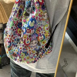 Drawstring Closure Backpack with Japanese Cartoon Print, Nylon Fabric, Niche Design - Trendy Student School Bag