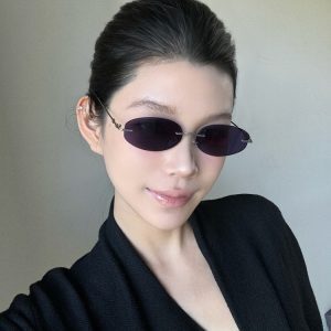 Retro Frameless Purple Small Oval High-End Sunglasses for Trendy Girls - European American Style, Perfect for Small Faces and Street Photography.
