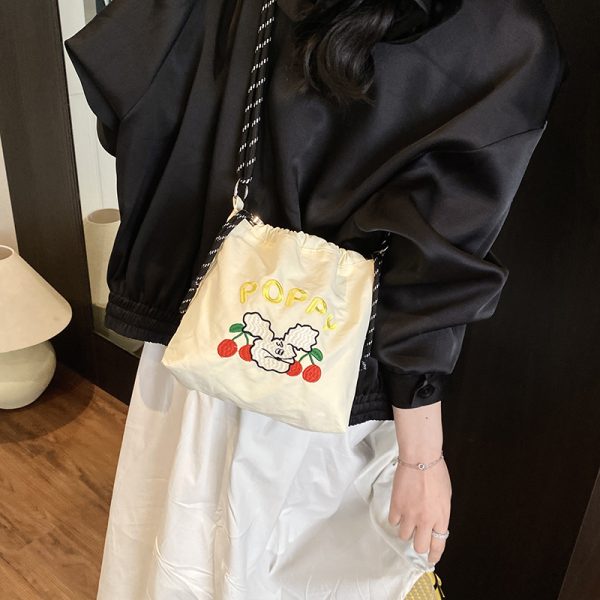 2025 Women's Summer Nylon Embroidered Canvas Drawstring Crossbody Bag - Simple Portable Phone Bag