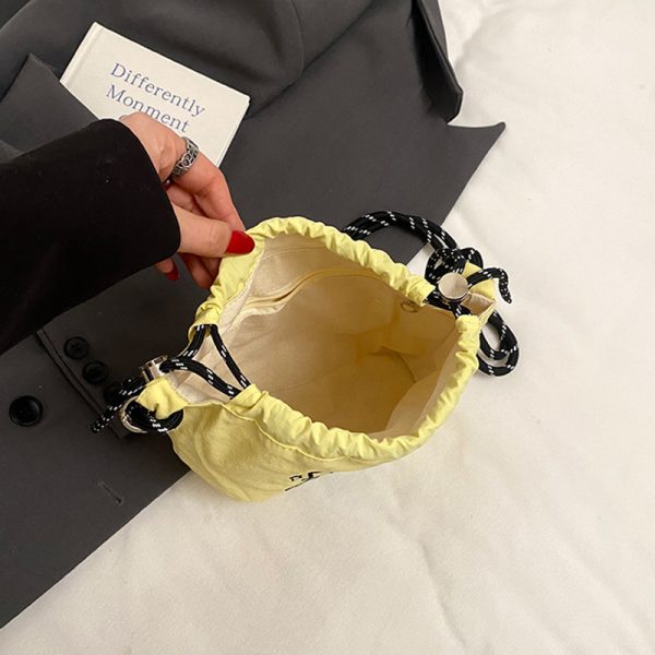 2025 Women's Summer Nylon Embroidered Canvas Drawstring Crossbody Bag - Simple Portable Phone Bag