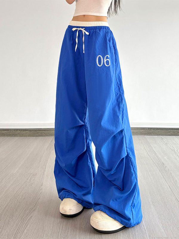 Color-Block Letter Short-Sleeve T-Shirt Top & Waist-Seamed Pleated Loose Dance Long Pants Set - Trendy Two-Piece Outfit