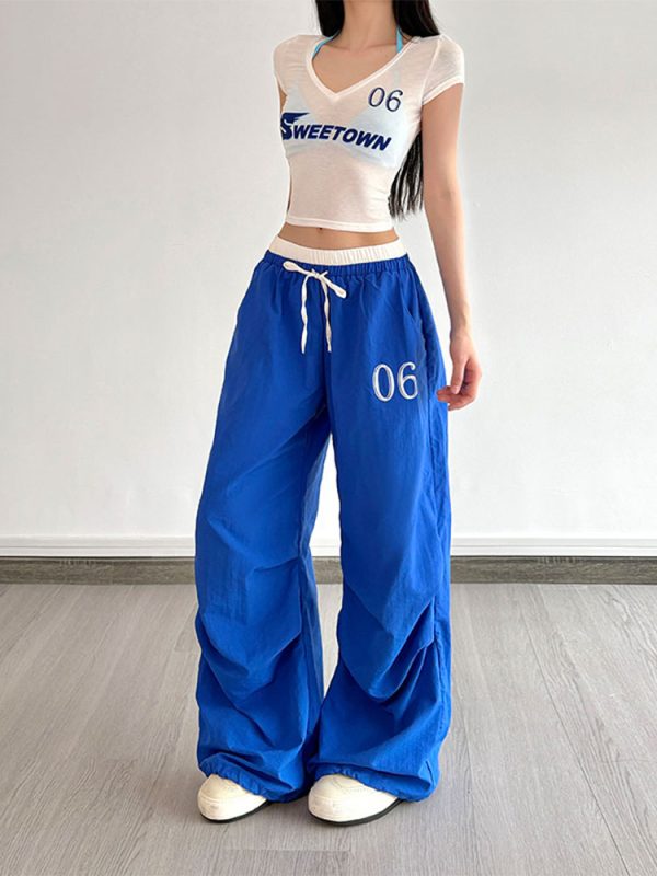 Color-Block Letter Short-Sleeve T-Shirt Top & Waist-Seamed Pleated Loose Dance Long Pants Set - Trendy Two-Piece Outfit