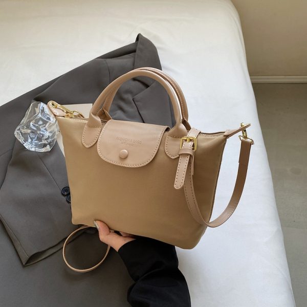 Korean-Style Retro Casual Bucket Bag for Women - Trendy Versatile Handheld Design, High-End Feel, Spring/Summer 2025 Collection