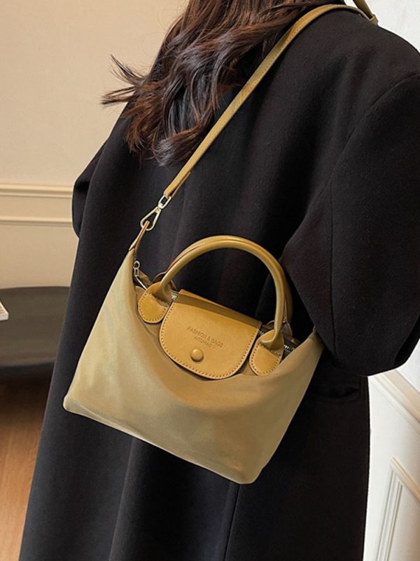 Korean-Style Retro Casual Bucket Bag for Women - Trendy Versatile Handheld Design, High-End Feel, Spring/Summer 2025 Collection