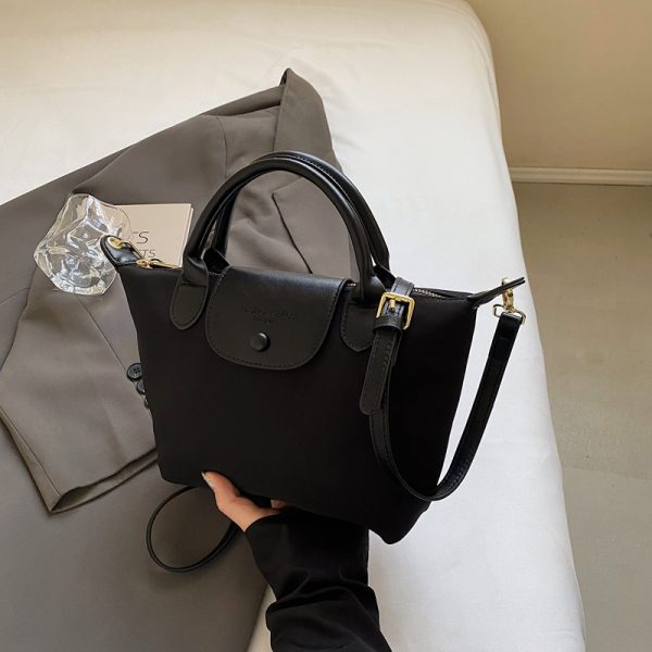 Korean-Style Retro Casual Bucket Bag for Women - Trendy Versatile Handheld Design, High-End Feel, Spring/Summer 2025 Collection