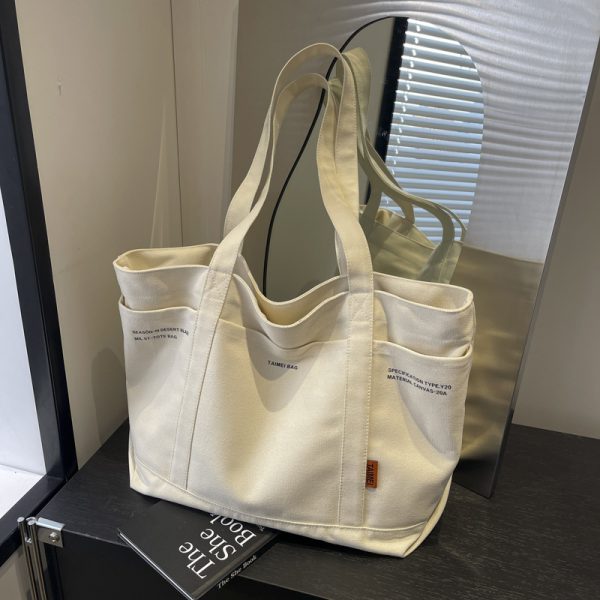 Versatile Canvas Tote Bag for Women - 2025 Spring/Summer Large Capacity Shoulder Bag for Students and Commuters