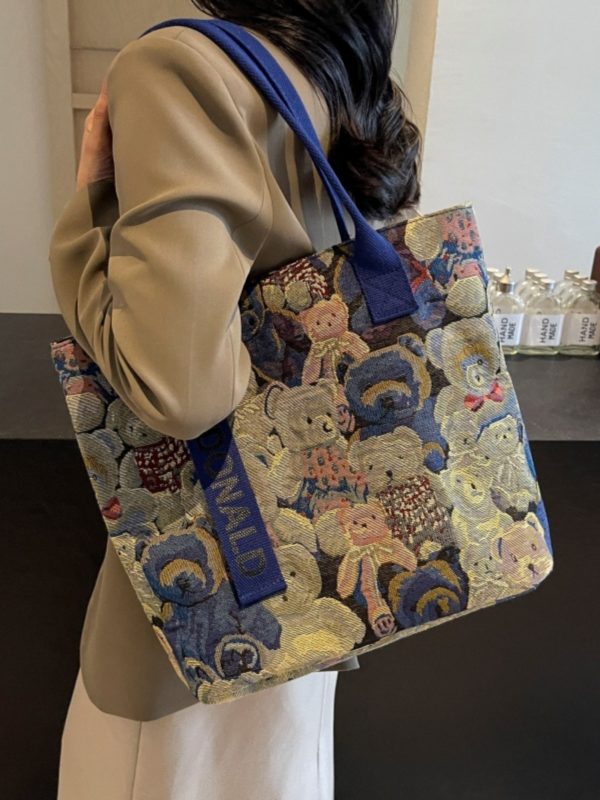 Womenâ€™s Niche Cartoon Canvas Tote Bag â€“ Large Capacity Spring 2025 Commuter Shoulder Bag for Students