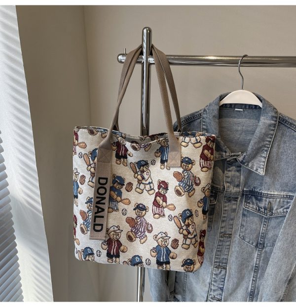 Womenâ€™s Niche Cartoon Canvas Tote Bag â€“ Large Capacity Spring 2025 Commuter Shoulder Bag for Students