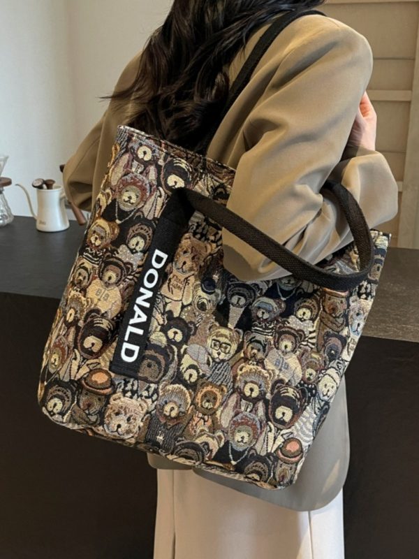 Womenâ€™s Niche Cartoon Canvas Tote Bag â€“ Large Capacity Spring 2025 Commuter Shoulder Bag for Students