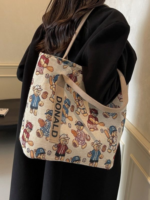 Womenâ€™s Niche Cartoon Canvas Tote Bag â€“ Large Capacity Spring 2025 Commuter Shoulder Bag for Students