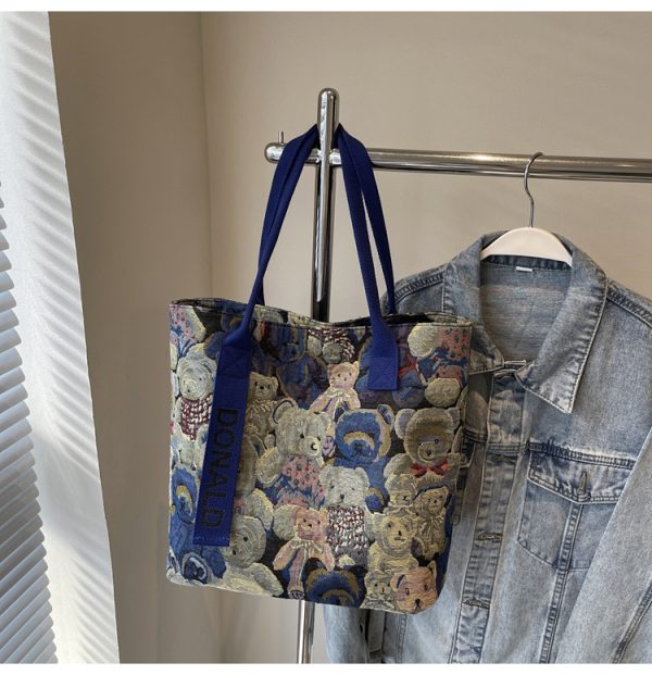 Womenâ€™s Niche Cartoon Canvas Tote Bag â€“ Large Capacity Spring 2025 Commuter Shoulder Bag for Students