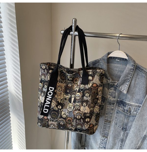 Womenâ€™s Niche Cartoon Canvas Tote Bag â€“ Large Capacity Spring 2025 Commuter Shoulder Bag for Students