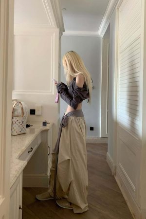Rase le sol Off-Shoulder Paneled Long Sleeve Top
