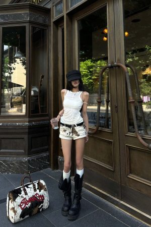 WARDEN EDGE Cutout Layered Tank Top with Asymmetric Hem