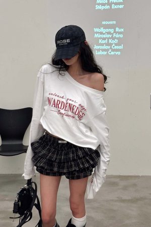 WARDEN EDGE Off-Shoulder Cropped Long Sleeve Tee with Asymmetric Hem